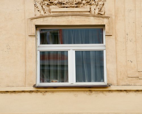Person relaxing by looking out of the window for eye comfort