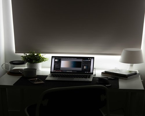 Comfortable ergonomic home office setup with natural light
